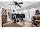 Office space with desk, ceiling fan, and wood accents at 3600 Morishop Nw Cv, Marietta, GA 30064