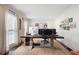 Bright and airy home office featuring a large desk and natural light at 3600 Morishop Nw Cv, Marietta, GA 30064