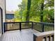 View from a rear deck offering wooded scenery at 4411 Flakes Mill Rd, Ellenwood, GA 30294