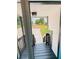 Front porch with modern railing overlooking the yard, offering an inviting entrance at 4411 Flakes Mill Rd, Ellenwood, GA 30294