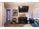 Bedroom with modern decor featuring a flat screen tv, and a door to another room at 3182 Latona Sw Dr, Atlanta, GA 30354