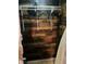 Interior closet with wooden plank walls and hanging storage system at 3182 Latona Sw Dr, Atlanta, GA 30354