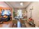 Bright dining area with hardwood floors, with table and chairs and plants on the side at 3182 Latona Sw Dr, Atlanta, GA 30354