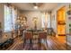Cozy dining room featuring hardwood floors, neutral color palette and decorative accents at 3182 Latona Sw Dr, Atlanta, GA 30354
