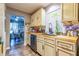 Modern kitchen with hardwood floors, wooden countertops, stainless steel appliances and white cabinets at 3182 Latona Sw Dr, Atlanta, GA 30354