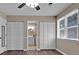 This spacious bedroom features two closets with louvered doors and wood-look flooring at 4378 Heritage Glen Ct, Marietta, GA 30068