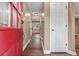Warm entryway with hardwood floors that leads to the kitchen at 4378 Heritage Glen Ct, Marietta, GA 30068