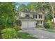 Charming two-story home with a two-car garage and well-maintained landscaping at 4378 Heritage Glen Ct, Marietta, GA 30068