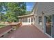 Home exterior showcasing the sunroom, deck, and backyard at 4378 Heritage Glen Ct, Marietta, GA 30068