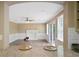Living room featuring fireplace, ceiling fan, and sliding glass doors to the deck at 4378 Heritage Glen Ct, Marietta, GA 30068