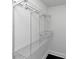 White closet with adjustable shelving for optimal storage and organization at 445 Westmeath Sw Dr, Atlanta, GA 30310