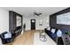 Bright living room featuring modern decor, sleek black accents, and stylish furnishings at 445 Westmeath Sw Dr, Atlanta, GA 30310