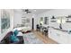 Studio apartment featuring a couch, bed, table, and kitchenette at 445 Westmeath Sw Dr, Atlanta, GA 30310