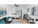 Studio apartment featuring a couch, bed, table, and window at 445 Westmeath Sw Dr, Atlanta, GA 30310