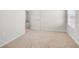 Neutral bedroom features carpet, a window, closet and access to the ensuite bathroom at 4932 Jatoba Rd, Acworth, GA 30101