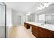 Spacious main bathroom featuring double vanities, a large soaking tub, and a separate shower at 12554 Huntington Trce, Alpharetta, GA 30005