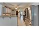 Well-lit kitchen with granite countertops and stainless-steel appliances, perfect for modern living at 1610 Windsong Park Dr, Dacula, GA 30019