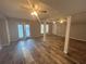 Finished basement featuring wood-look floors, windows, and recessed lighting at 3808 Holy Cross Ct, Decatur, GA 30034