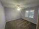 Bedroom with ceiling fan, one window, and neutral color scheme at 3808 Holy Cross Ct, Decatur, GA 30034