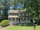 Charming two-story home with a covered porch, and well-maintained landscaping at 3808 Holy Cross Ct, Decatur, GA 30034