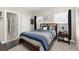 Cozy bedroom with neutral walls, a large window, and view to hall at 344 Nottingham Dr, Marietta, GA 30066
