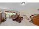 Spacious bonus room with lots of natural light and various seating and activities at 344 Nottingham Dr, Marietta, GA 30066