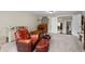 Expansive bonus room featuring comfortable seating, work spaces, and natural light at 344 Nottingham Dr, Marietta, GA 30066