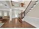 Elegant entry with hardwood floors, wainscoting, and an open view to the living spaces at 344 Nottingham Dr, Marietta, GA 30066