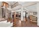 Grand foyer with wood floors, staircase with iron spindles, and an open-concept living space at 344 Nottingham Dr, Marietta, GA 30066