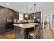 Modern kitchen with a large center island, granite countertops, and stainless steel appliances at 344 Nottingham Dr, Marietta, GA 30066