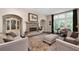 Comfortable living area with a stone fireplace, large windows, and cozy seating at 344 Nottingham Dr, Marietta, GA 30066