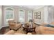 Cozy living room featuring neutral tones, plush seating, and plenty of natural light at 344 Nottingham Dr, Marietta, GA 30066