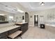 Bright main bathroom with double vanity, soaking tub, and walk-in shower at 344 Nottingham Dr, Marietta, GA 30066