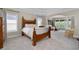 Spacious main bedroom with a seating area, natural light, and a tray ceiling at 344 Nottingham Dr, Marietta, GA 30066
