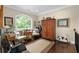 Cozy study with large window, wood floors, and elegant furniture at 344 Nottingham Dr, Marietta, GA 30066