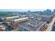 Aerial view showcases city buildings and streetscapes at 361 17Th, Chattahoochee Hills, GA 30363
