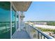 Condo balcony view overlooking the city with glass railings and a clear skyline at 361 17Th, Chattahoochee Hills, GA 30363