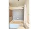 Clean bathroom featuring a shower-tub combination with tile surround at 361 17Th, Chattahoochee Hills, GA 30363