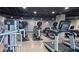 Modern gym with treadmills, elliptical machines, and weight training equipment at 361 17Th, Chattahoochee Hills, GA 30363