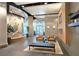 Lobby area featuring seating, art, fireplace and upscale decor at 361 17Th, Chattahoochee Hills, GA 30363