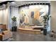 Lobby area showcasing contemporary art, bench seating, and potted plants at 361 17Th, Chattahoochee Hills, GA 30363