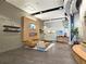 Modern lobby area with seating, fireplace, TV, and reception desk at 361 17Th, Chattahoochee Hills, GA 30363