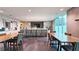 Comfortable resident lounge area with bar, tables, and tv viewing area at 361 17Th, Chattahoochee Hills, GA 30363
