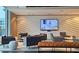 Resident lounge with comfortable seating and a large television for entertainment at 361 17Th, Chattahoochee Hills, GA 30363