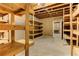 Basement with shelving storage and concrete flooring at 4924 Locklear Way, Marietta, GA 30066