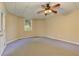 Finished basement with window and ceiling fan at 4924 Locklear Way, Marietta, GA 30066