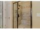Tiled shower with glass door features built in seating at 4924 Locklear Way, Marietta, GA 30066