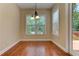 Bright breakfast nook features hardwood floors and a view of the deck at 4924 Locklear Way, Marietta, GA 30066