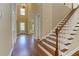 Elegant foyer with hardwood floors, staircase and tall ceilings at 4924 Locklear Way, Marietta, GA 30066