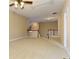 A carpeted hallway with white railings and stairs provides an open view to the lower level at 4924 Locklear Way, Marietta, GA 30066